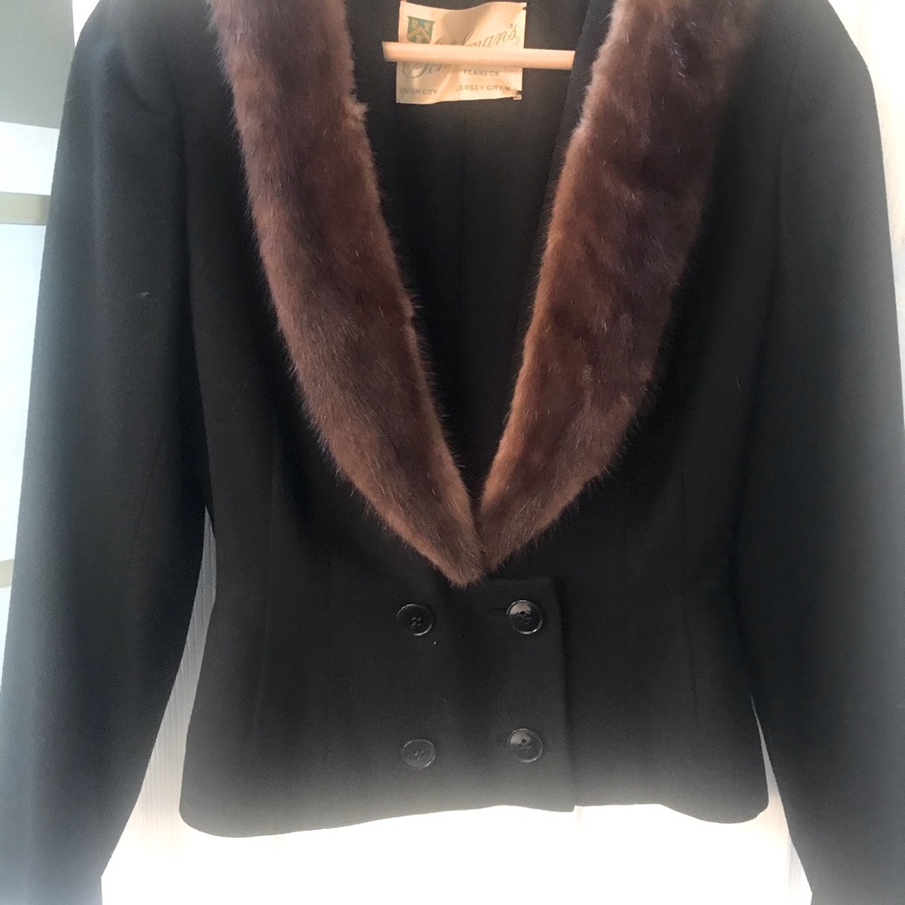 Vintage black jacket with genuine fur.